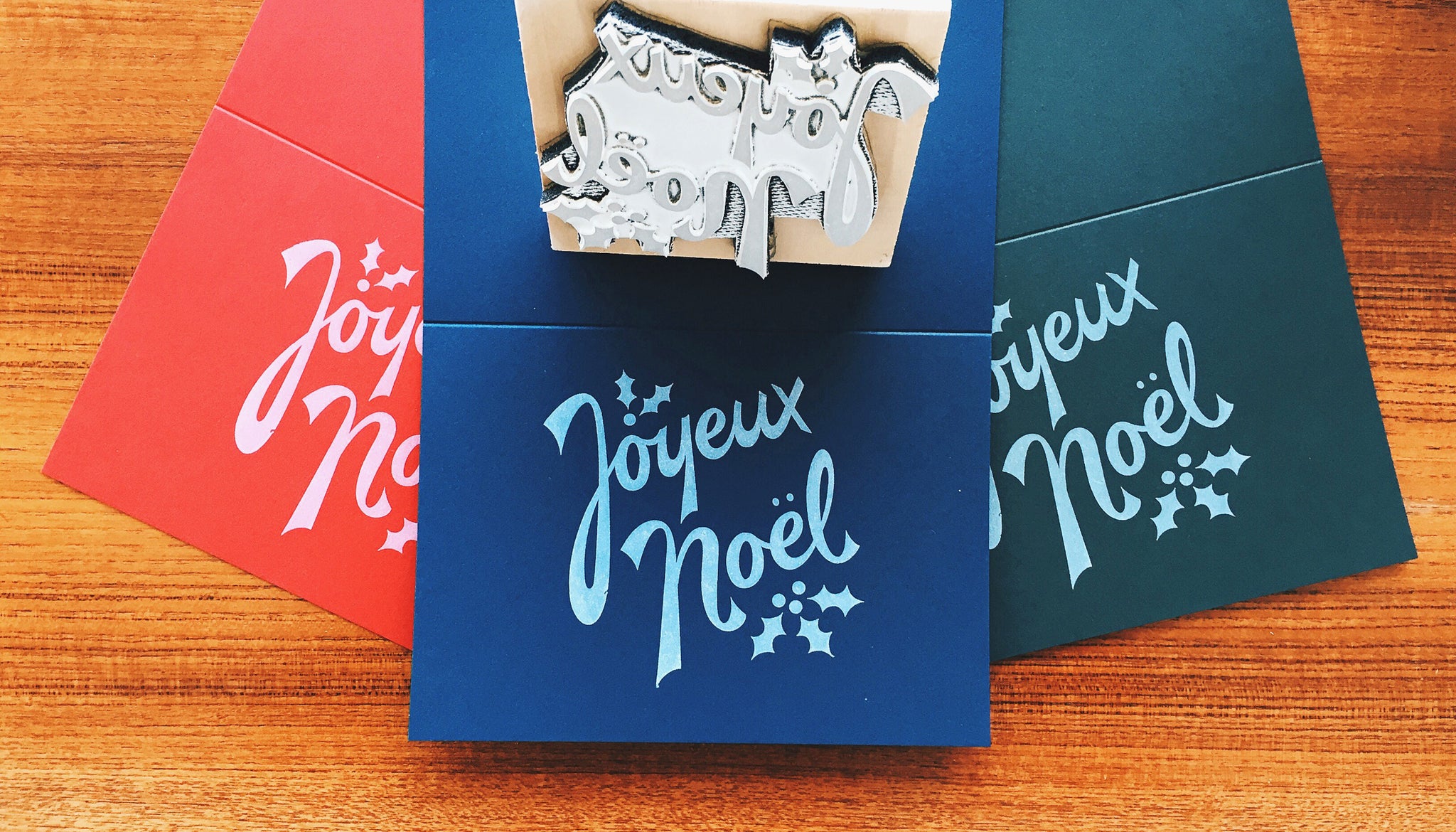 The Joyeux Noël greeting card comes in 3 decadent colors.