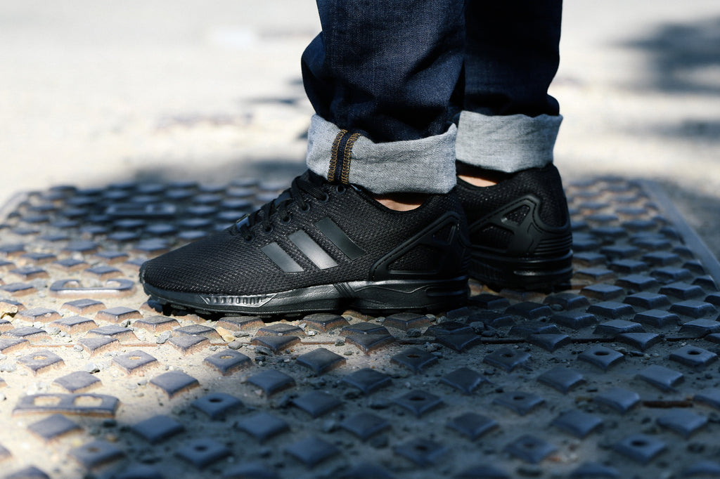 all black adidas zx flux