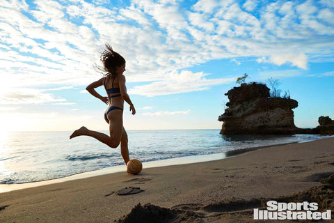 Alex Morgan was photographed by Ben Watts in St. Lucia for Sports Illustrated. Swimsuit by Pistol Panties