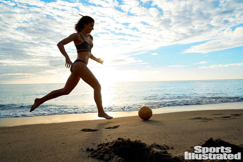 Alex Morgan was photographed by Ben Watts in St. Lucia for Sports Illustrated. Swimsuit by Pistol Panties