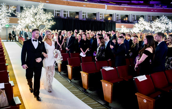 Amy West and Gary Becker wedding at Smart Financial Center in Sugarland, Custom gown by David Peck.