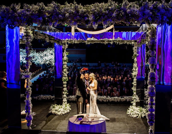 Amy West and Gary Becker wedding at Smart Financial Center in Sugarland, Custom gown by David Peck.