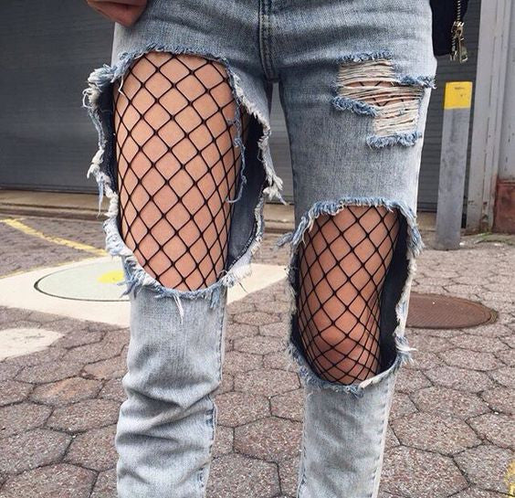fishnet under ripped jeans