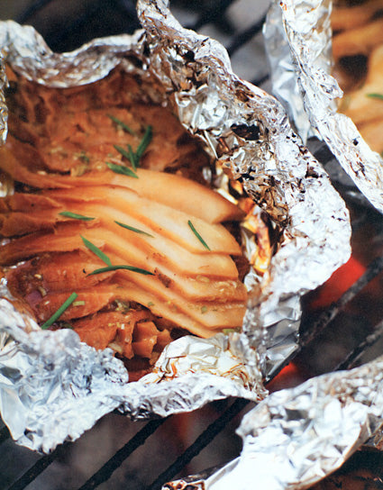 Foil-Wrapped Matsutake with White Soy and Ginger over a flame