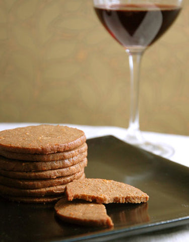 Stack of Porcini & Cheddar Cheese Wine Crackers made with Wine Forest Wild Foods Primium Dried Wild Mushroom Porcini Powder and Porcini Salt