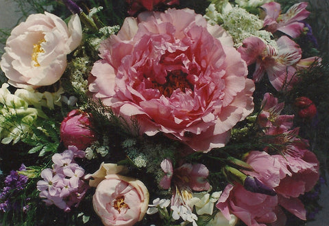 Detail of centerpiece with tree peonies, phlox, iris, asparagus fern.