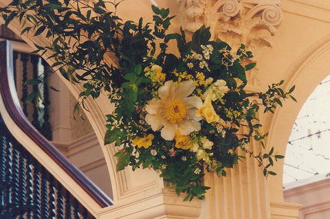 Italian rustic garland with herbaceous peony, roses and snapdragons set the scene for a spring wedding.