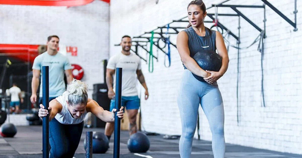 women training at the gym