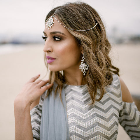indian girl wearing jewellery on beach