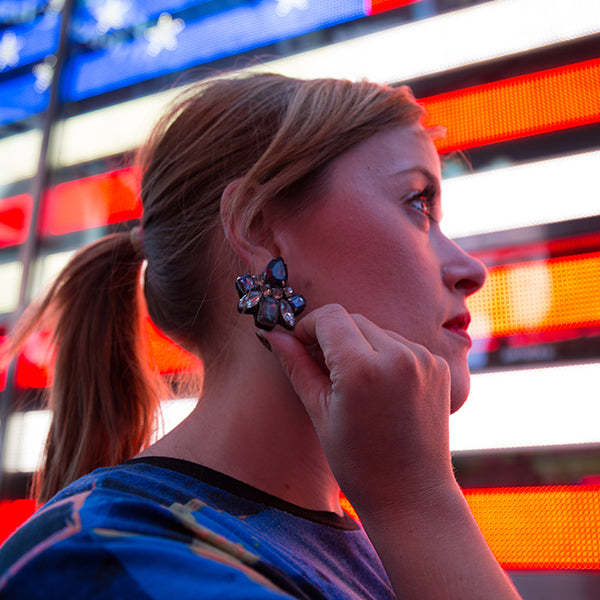 Woman wearing statement earrings in New York