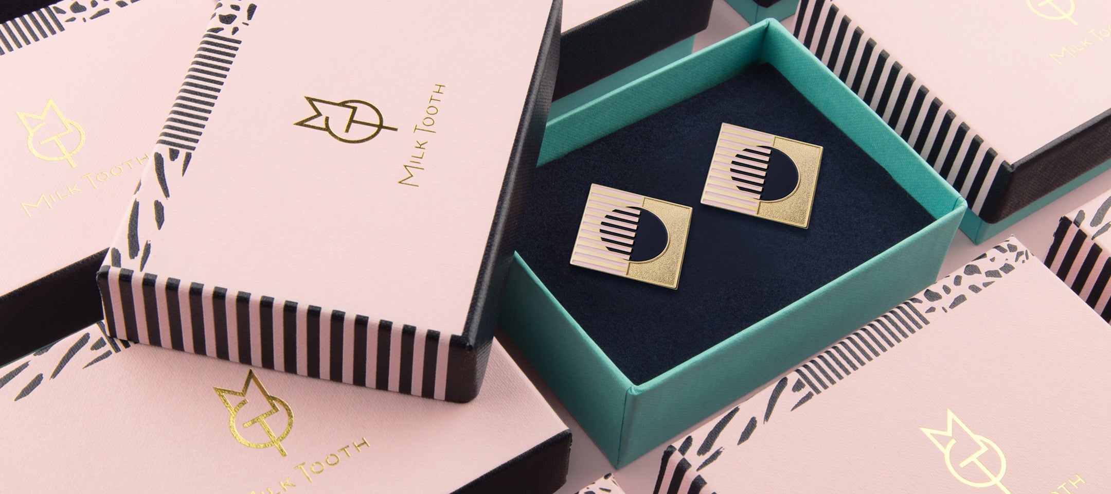 Milk Tooth London Earrings and packaging