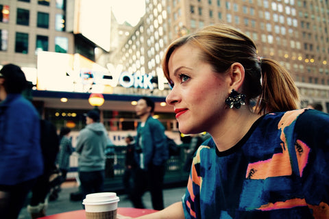 Woman wearing statement earrings in New York
