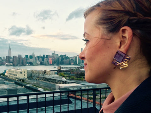 Woman wearing statement earrings