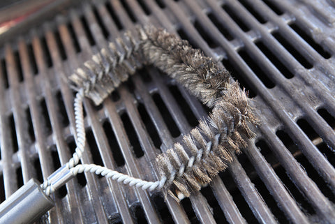 grill cleaning tools on clean grill