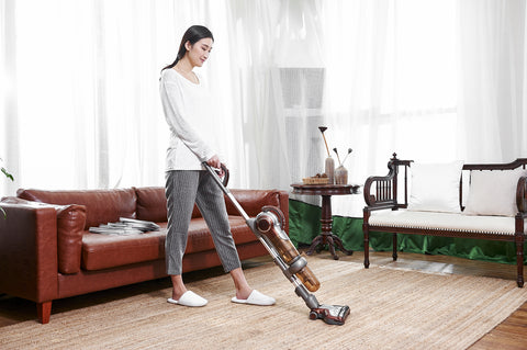 Woman With Upright Vacuum