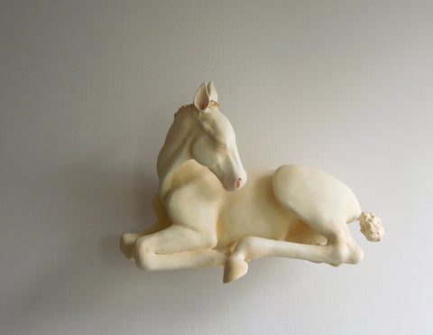 Meditative foal horse wall sculpture by Susie Benes