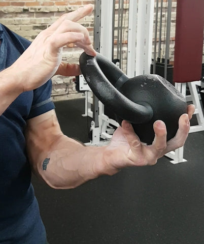 warming up for bottoms-up kettlebell exercises