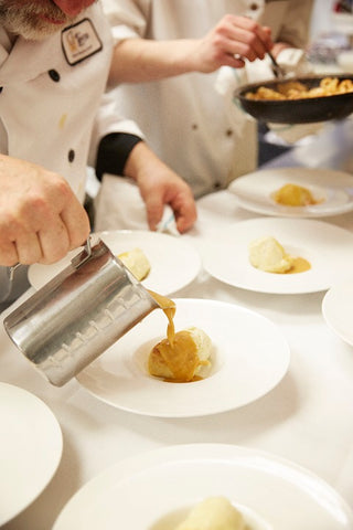Preparation of a Group Menu by our experienced team in one of our kitchens!