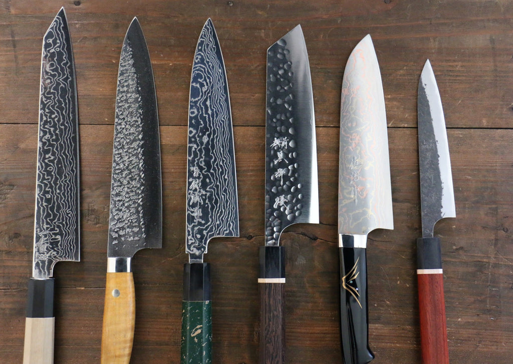 A photo of several limited edition knives only sold at Seisuke Knife Portland