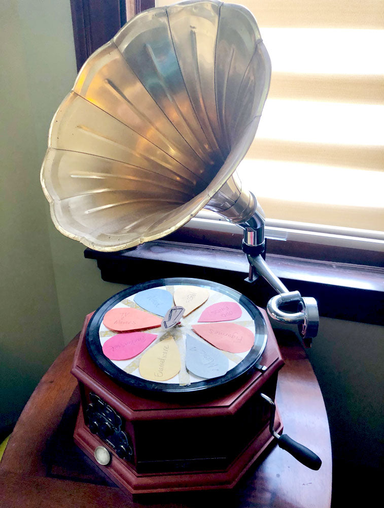 House Tour - Harmony uses her vintage record player as a spinner to choose the themes for the retro roulette
