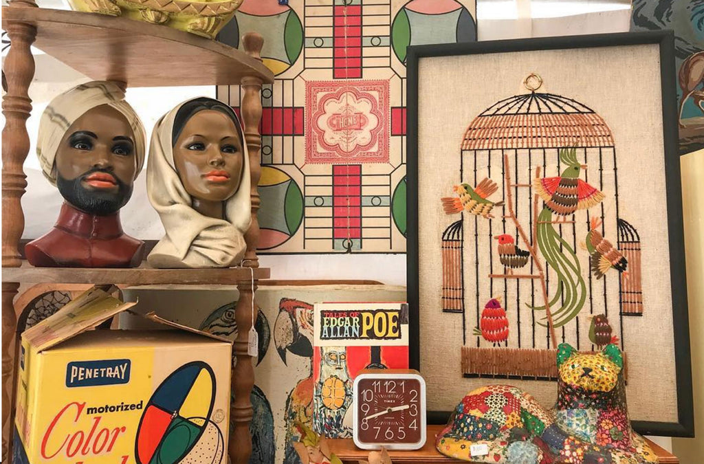 House Tour: Ryann’s Mid Century Home - shelfie with vintage treasures