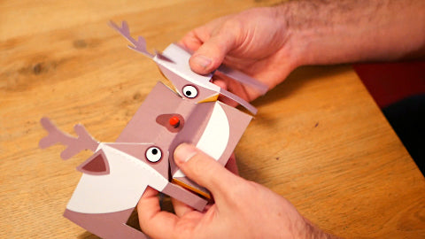 Image of a paper reindeer being folded