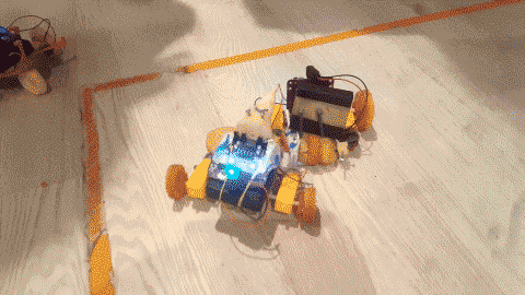 A GIF of two vegetable robots fighting