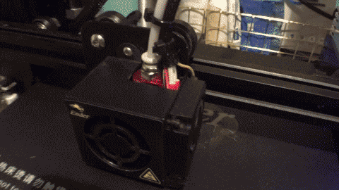A time lapse of a pink 3D print being 3D printed.