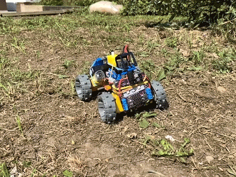 Looping video of LEGO off-roader spinning on the spot on rough ground