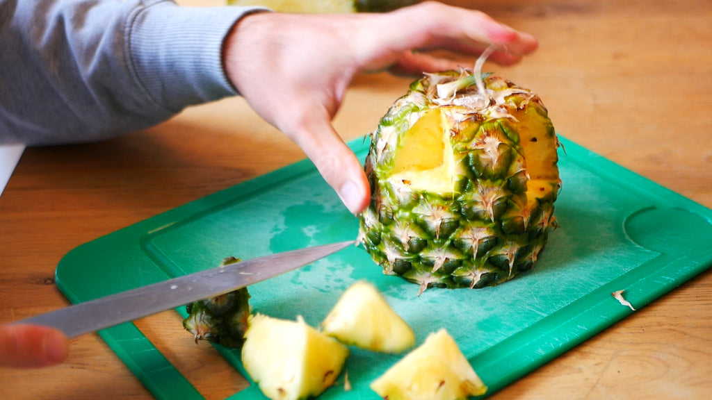 Wedge removed from the bottom of the lower part of the pineapple