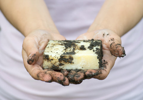 Hands Holding Dirty Soap