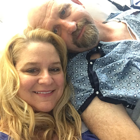 Fashion designer Jill Alexander with her husband in hospital