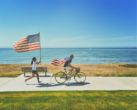 Bicycling wearing an American flag