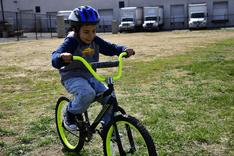 Wish for Wheels Kid on Bike