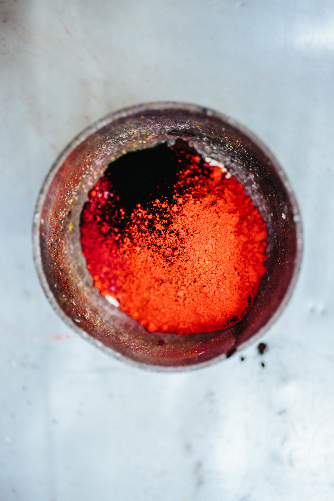 Aerial view of red powdered dye for colouring acetate