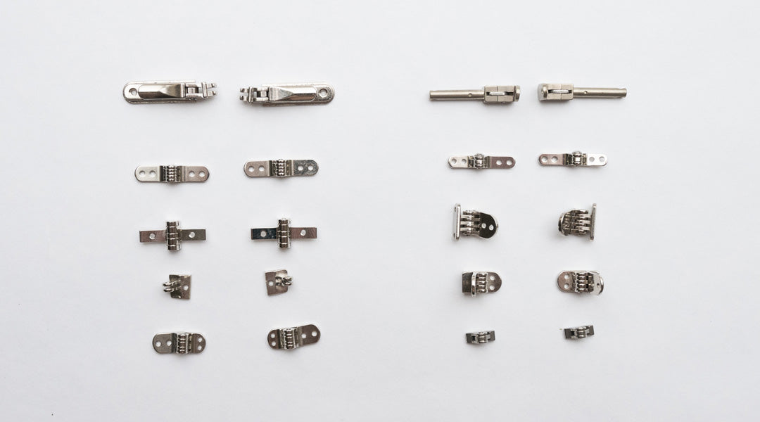 Assortment of different types of glasses hinge parts