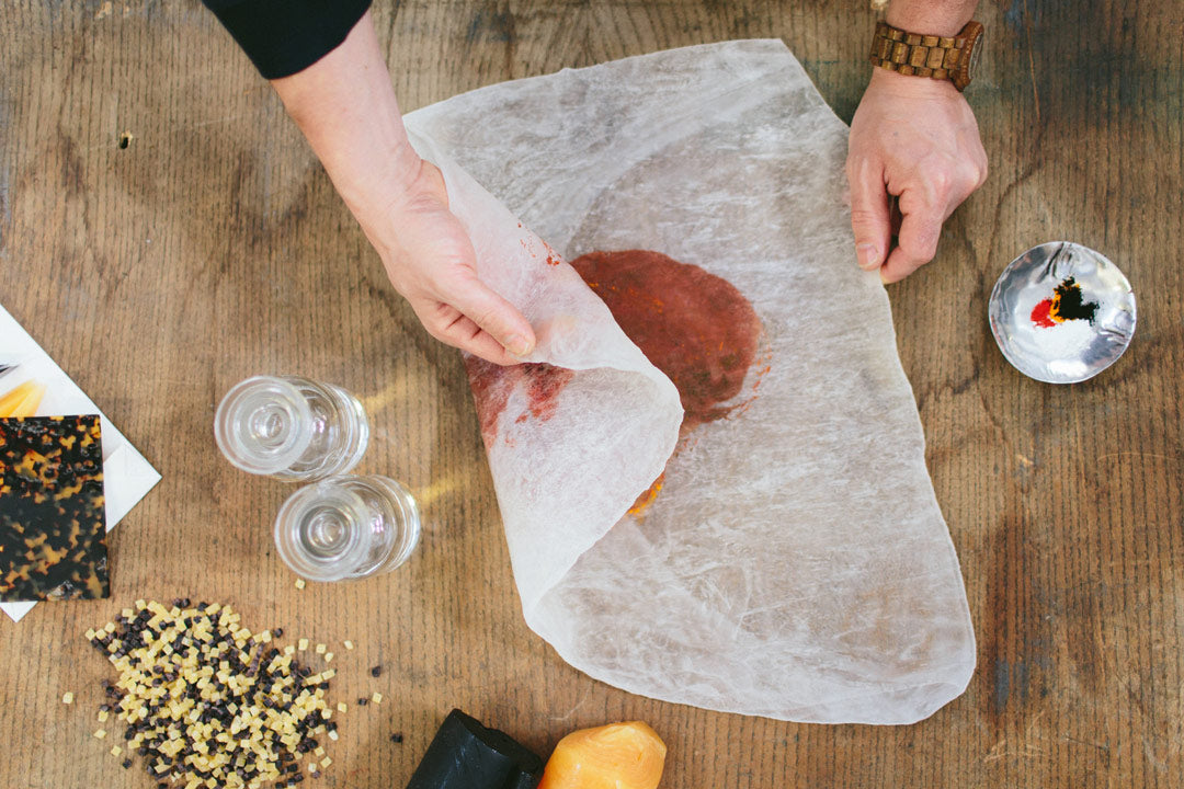 Mixing-coloured-dye-through-cellulose-acetate-on-table