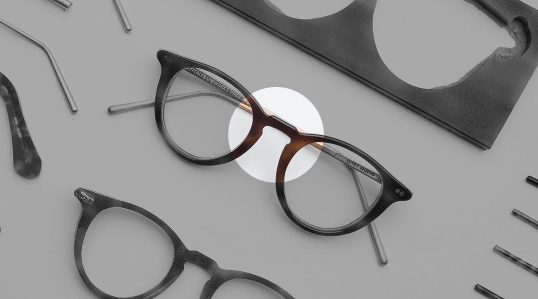 The keyhole bridge of a tortoise acetate glasses frame