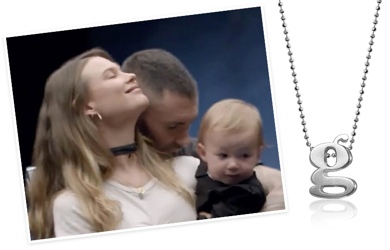 Behati Prinsloo wearing Alex Woo Little Letter G in husband Adam Levine's Maroon 5 "Girls Like You" Music Video