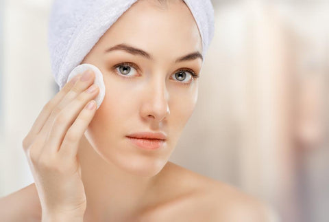 woman treating face to get rid of dead skin