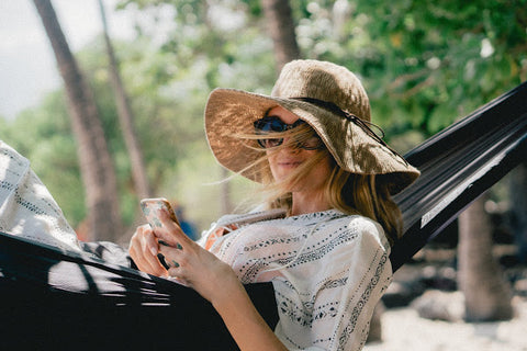 woman wearing straw hat