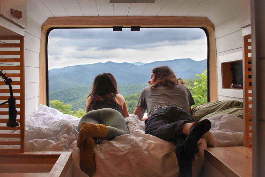 Looking out the back of the Ram promaster with Katelynn and Ethan at the hunters vanlife