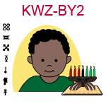 KWZ-BY2 Dark skinned toddler boy with African hair and green shirt next to Kwanzaa Kinara with seven candles