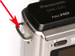 Slotted Lug-mount on camera. Panasonic Lumix GX1 Attach gordy's lug-mount camera strap and o-ring strap bumper.