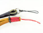 gordy's string camera strap. Black leather black wrap. Light brown leather red wrap. 