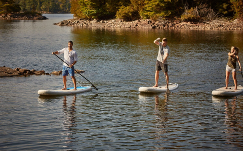 Paddle boarders using inflatable SUP Boards