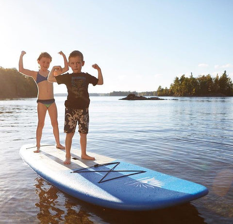 kids stand up paddle boarding