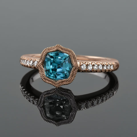 blue zircon ring set in rose gold.