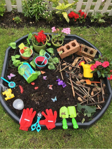 Outdoor kids mini garden with mini gardening gloves and spade