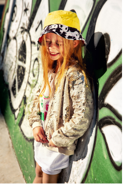Little Hotdog Watson girl wearing sun hat from the Hooligans Magazine shoot